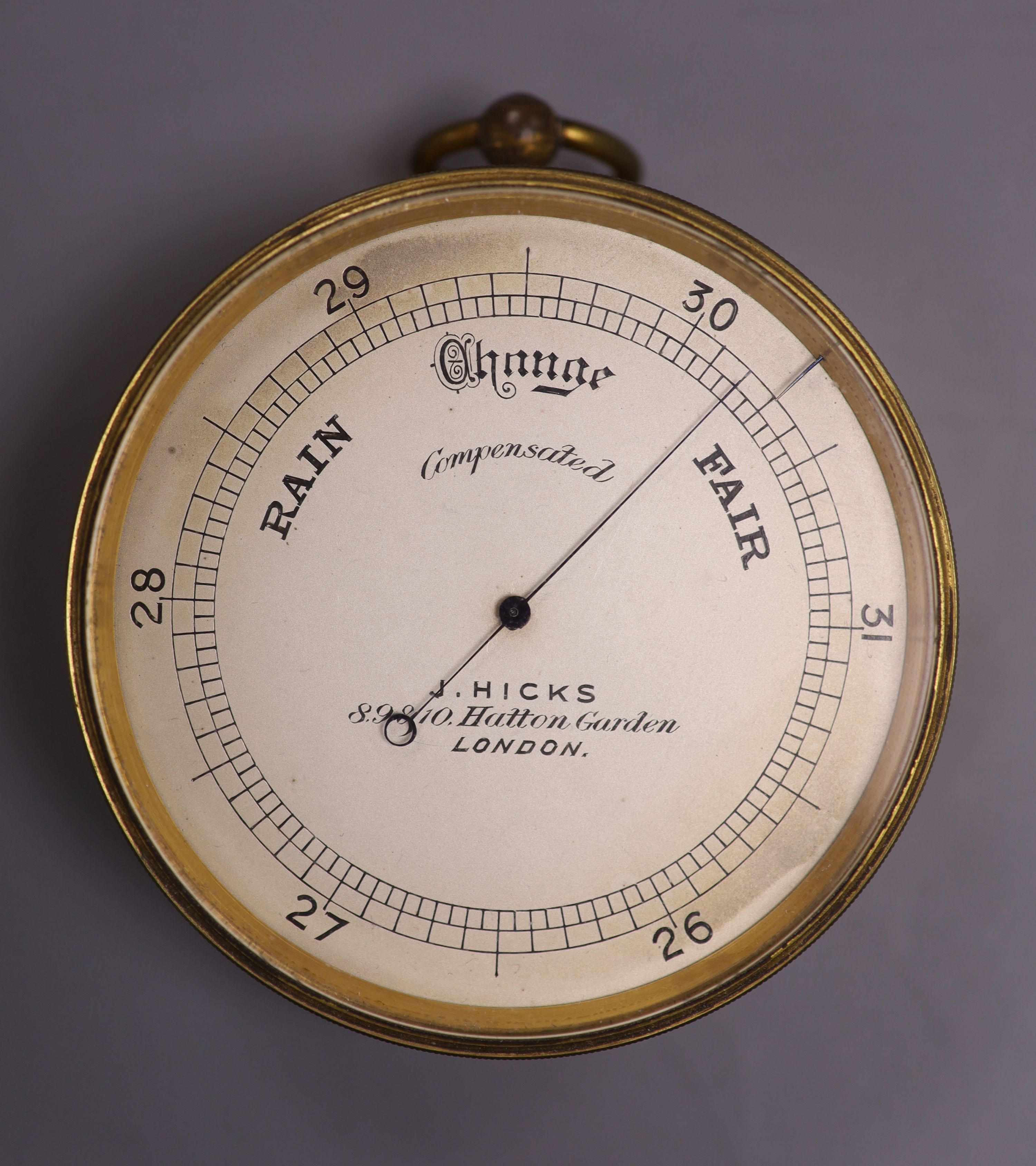 J, Hicks of London. A compensated travelling barometer, diameter 7.5cm